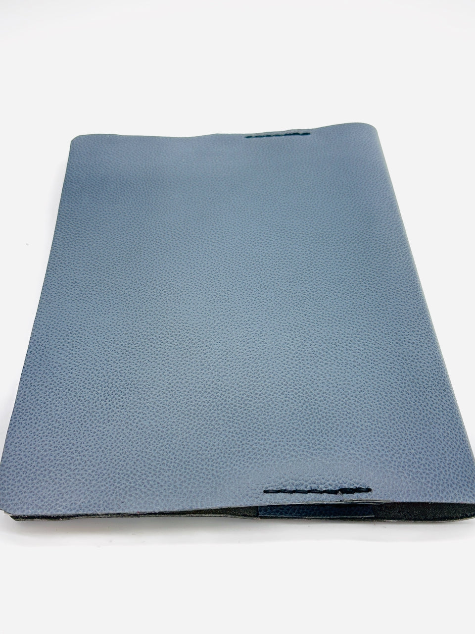 back cover of blue and black leather journal