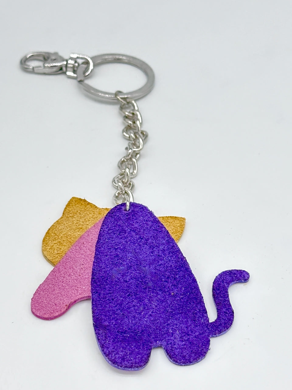 suede back of leather cat key chain purse fob in colors of purple, pink and yellow