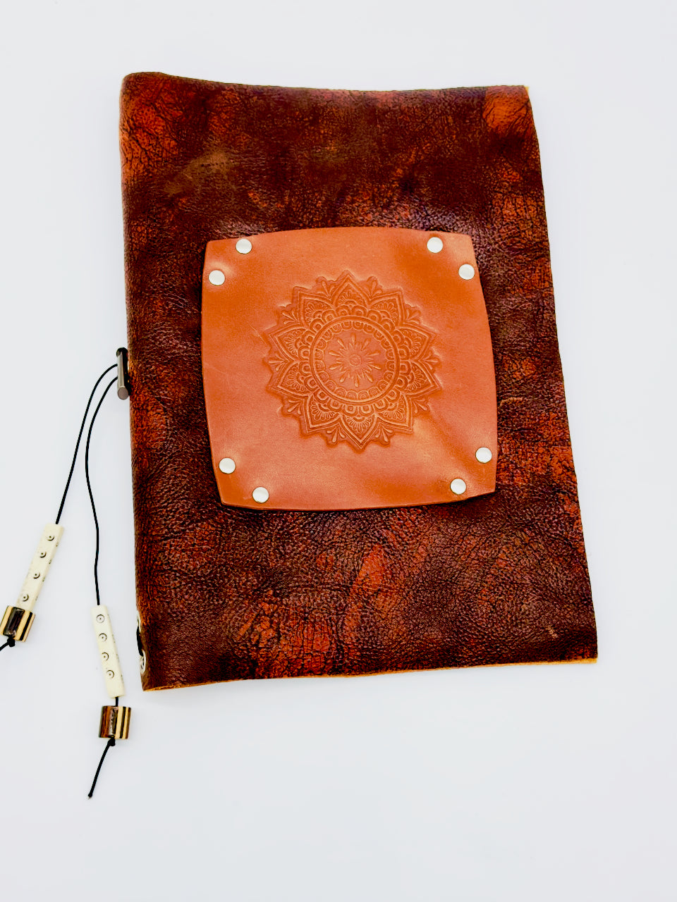front cover of distressed leather brown journal diary